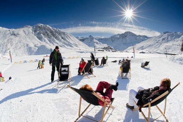 Skiers relaxing at Easter ski resort