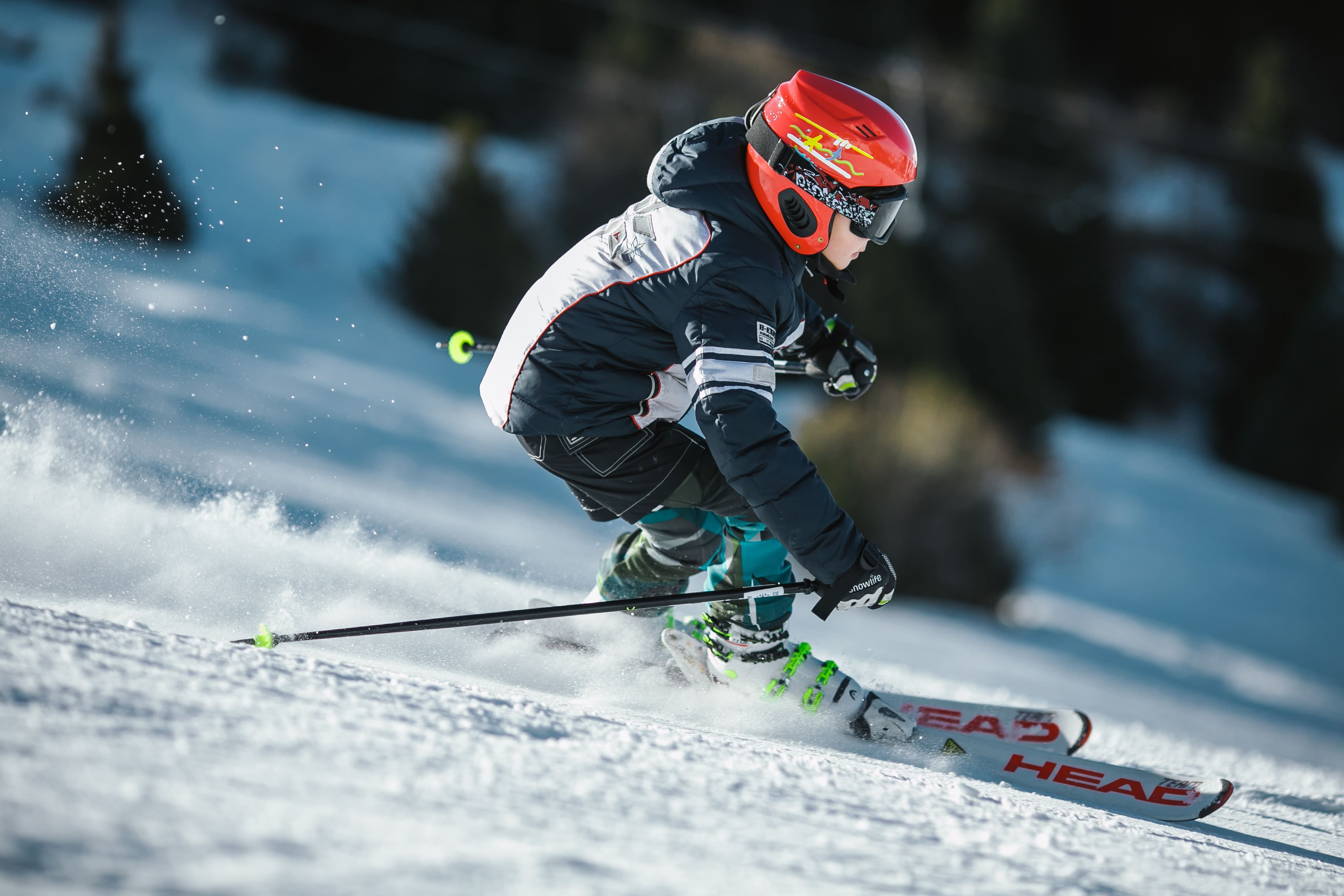 A child skiing down the mountain