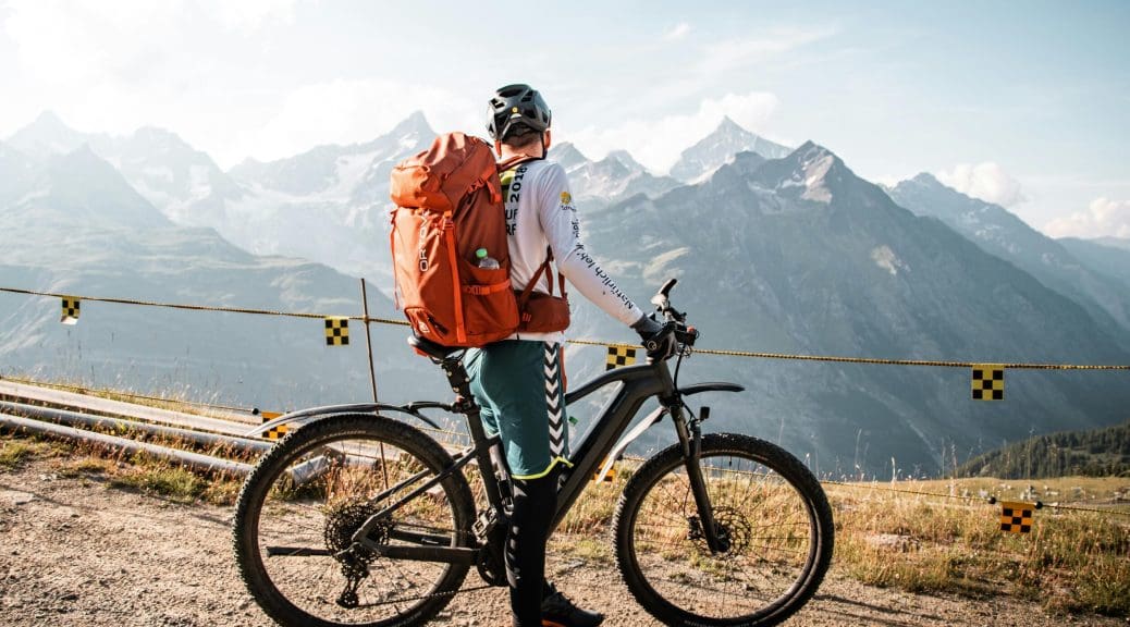 Cyclist road cycling in the Alps