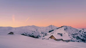 A beautiful sunset over snowy mountains